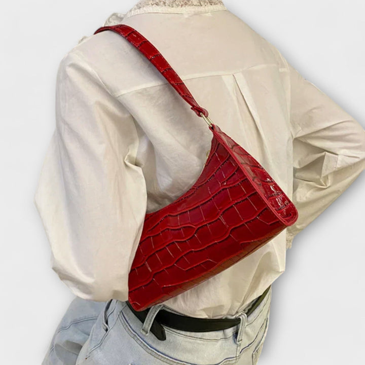 Lora. - Lesklá kožená taška