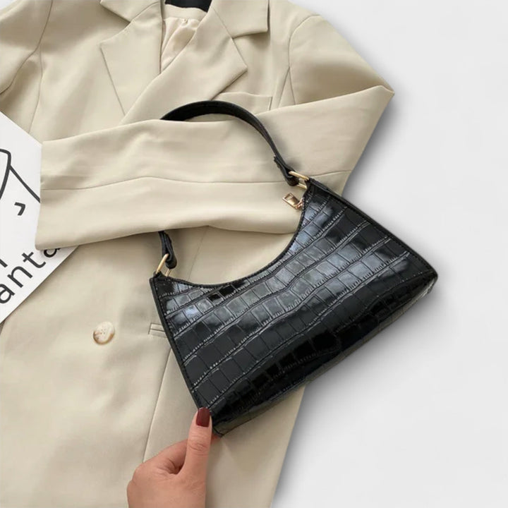 Lora. - Lesklá kožená taška